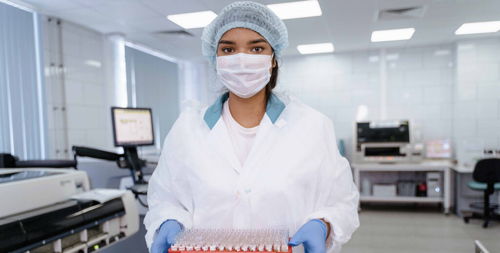 Young lady working in a laboratory.